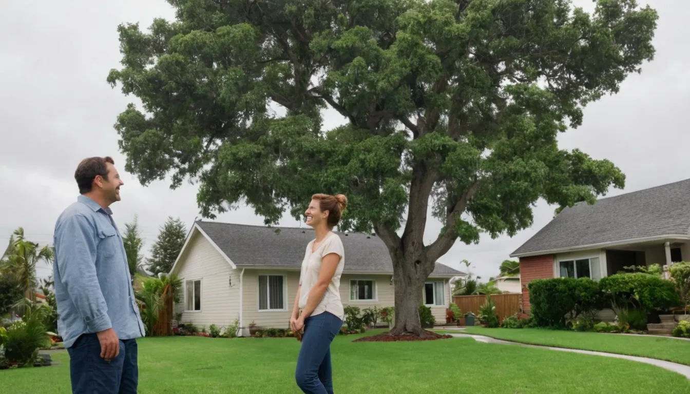 Homeowner talking with a local tree provider in the Bloomfield area